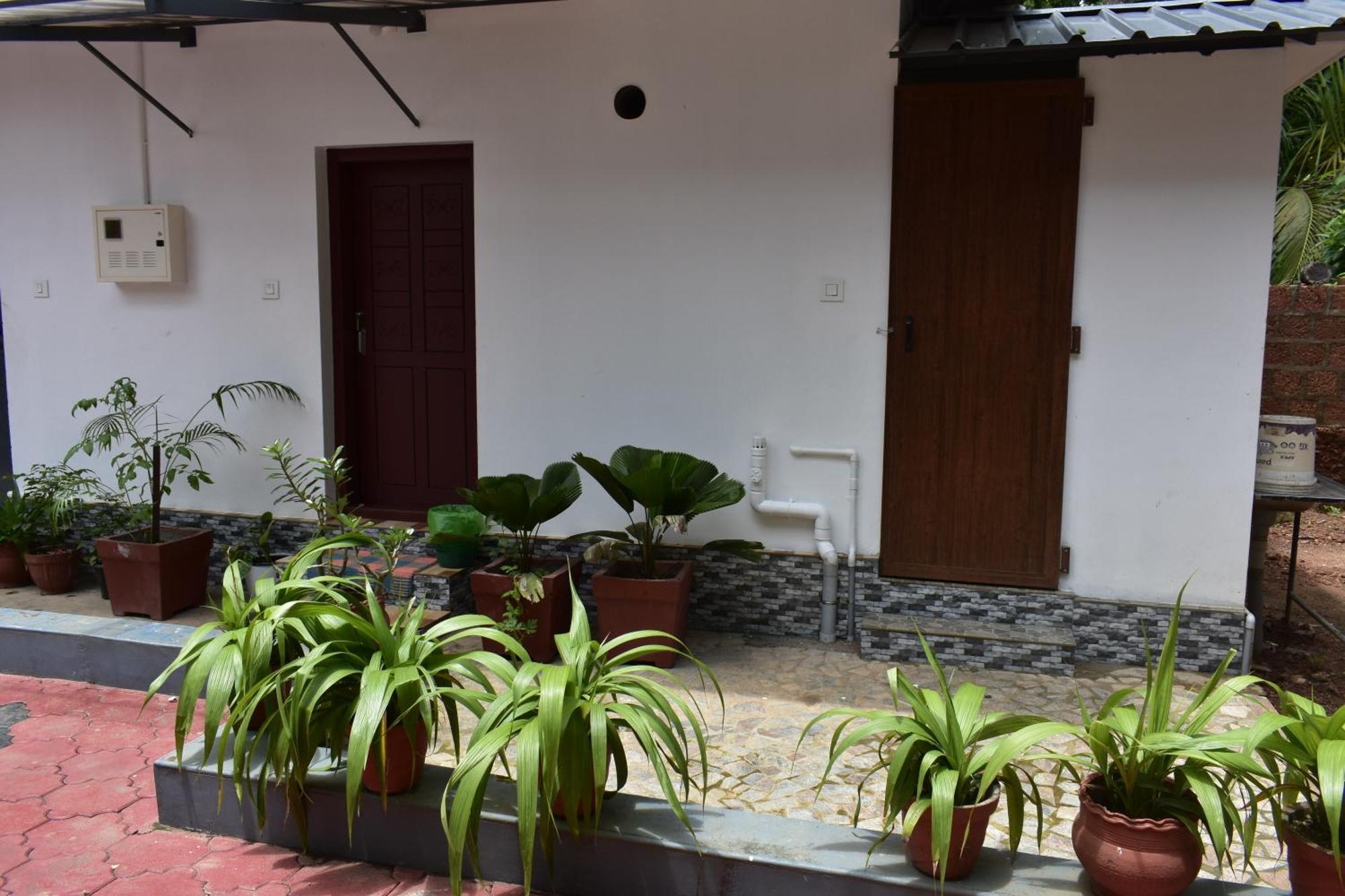 Benny Nivas Appartement Kannur Buitenkant foto
